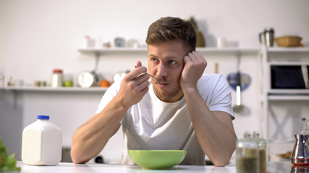 Male-eating-breakfast-and-thinking-about-work,-easy-meal-day-beginning,-food---ss-feat