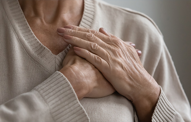 Mature-elderly-woman-feeling-heart-pain-touching-chest-with-both-hands-Proven-Benefits-of-Chelation-Therapy