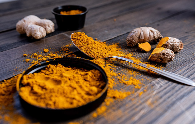 close-up-shot-of-turmeric-powder----Curcumin----px-body