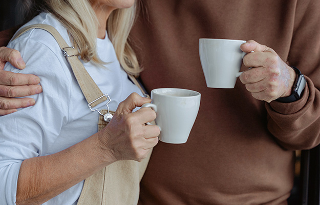 people-holding-white-mugs----What-Does-Grip-Strength-Mean-for-Your-Health---px-body