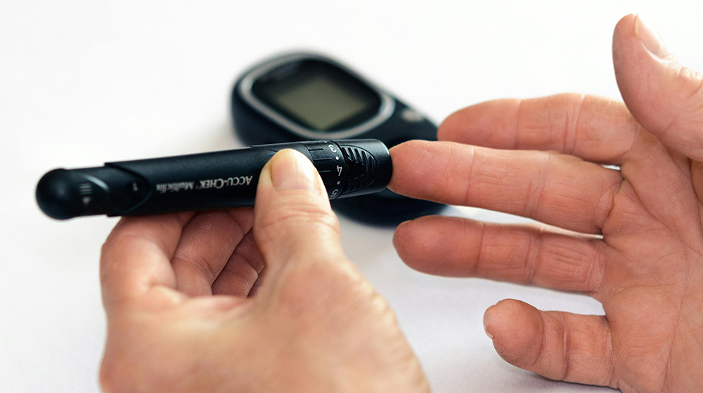 Person-Holding-Black-Tube-On-the-spot-Diabetes-Management-How-to-Reduce-Blood-Sugar-Levels-Immediately-px-feat