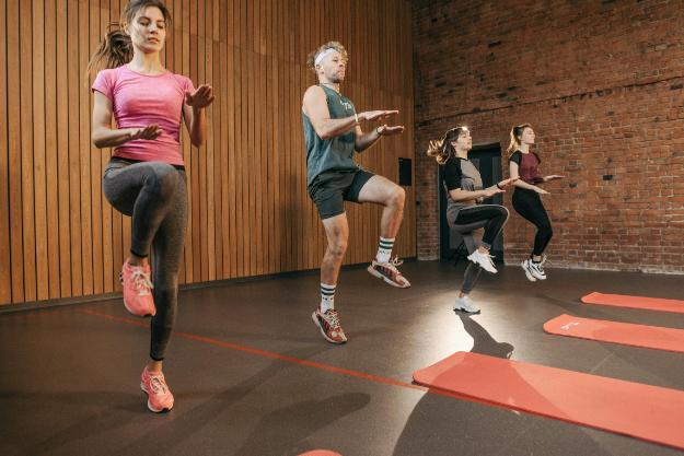 A Group of People in the Fitness Center | HIIT Workouts for Beginners
