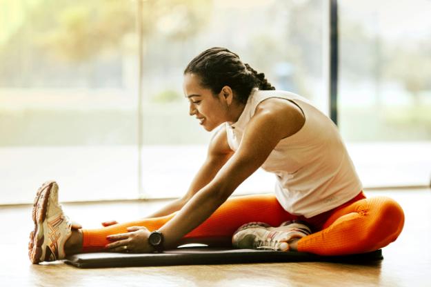 Woman Stretching on Ground px